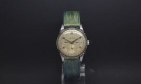 Gentlemen's Vintage Movado triple date wrist watch, two tone dial with subsidiary seconds dial,