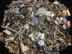 a selection of various silver charms and bracelet, marked and tested as silver, approx gross