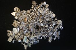 a selection of various charms and bracelets, marked and tested silver, approx gross weight 730gr