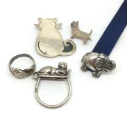 a selection of silver jewellery in a Animal style, various rings and brooches, marked and tested