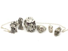 a selection of silver Skull set Jewellery