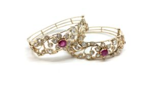 Pair of Burmese ruby and old cut diamond floral bangles, a single cushion cut ruby set to the centre