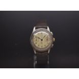 A Gentlemen's Stainless steel chronograph Circa 1940s. The watch has two register dial with a