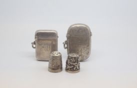 A selection of silver match box holders and thimbles, marked and tested as silver, approx gross