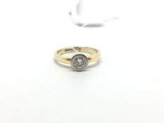 Single stone diamond ring, brilliant cut diamond, bezel set, estimated diamond weight 0.35ct,
