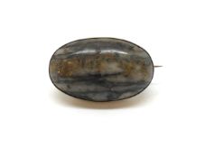 Gem set brooch, large oval cabochon hard stone set in a rose gold mount, 38x25mm, approximately 14.