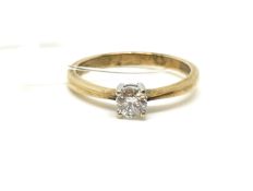 A solitaire diamond ring. Approximately 1.9g gross, ring size M. Fully hallmarked for 9ct gold.