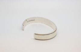 A Tiffany and Co solid silver bangle, marked and tested as silver approx gross weight 68.0gr