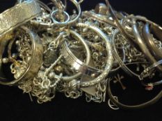 A selection of Silver Plain and engraved Bangles and Bracelet, tested as silver, gross weight 1084.