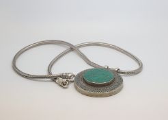 A Large Green stone set pendant and chain, marked and tested as silver, approx gross weight 100gr