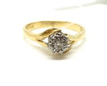 A solitaire diamond ring. Approximately 3.1g gross, ring size N 1/2. Fully hallmarked for 18ct gold.