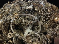 A selection of Silver various charms and bracelets, tested as silver, Gross weight 928.0gr