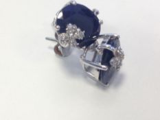 Sapphire and diamond stud earrings, central oval cut sapphires, in white metal tested as 18ct