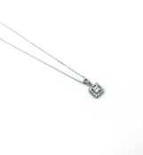 Contemporary princess cut diamond cluster pendant, central princess cut diamond surrounded by a