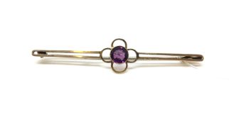 Gem set bar brooch, stamped and tested as 9ct, metal pin