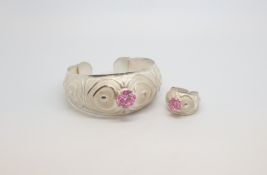 A lovely Jewellery suite, single stone pink gem set Bangle and Ring, marked and tested as silver,