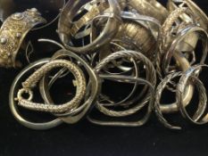 A selection of Silver Plain and engraved Bangles and Bracelet, tested as silver, gross weight 1114.