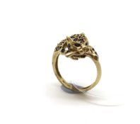 Gem set Leopard ring, in 9ct yellow gold, ring size O, approximately 3.9g gross