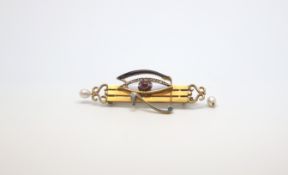 Antique Egyptian revival Eye of Horus brooch, red cabochon centre with white, black and blue enamel,