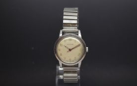 Gentlemen's Garrard stainless steel wrist watch. Circa 1960s A off white cream dial with Arabic