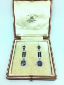 Pair of untreated Ceylon sapphire and diamond earrings, cushion cut sapphires suspended from diamond