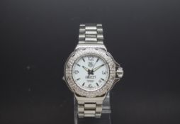 Ladies Tag Heuer "Formula One" Professional, Mother of Pearl Dial, Diamond set Bezel, with a