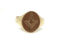 Masonic signet ring, oval top, in yellow metal hallmarked 9ct, ring size U, approximately 2.7g