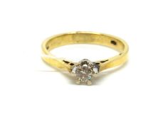 A solitaire diamond ring. Approximately 3.3g gross, ring size O. Fully hallmarked for 18ct gold.