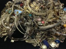 A selection of Silver various charms and bracelets, tested as silver, Gross weight 860.0gr