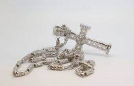 A fancy silver white stone set Cross and chain, necklace, marked and test as silver, approx gross