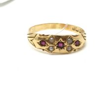 Antique ruby and pearl set band, in yellow metal hallmarked 18ct, ring size R1/2, approximately 2.8g