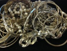 A selection of Silver Plain and engraved Bangles and Bracelet, tested as silver, gross weight 1092.