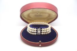 Mikimoto vintage pearl bracelet, three rows of pearls approximately 6.5mm, strung to a silver