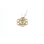 Peridot and pearl pendant, 6mm round cut peridot sith a border of six seed pearls, 25x22mm, tested