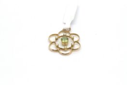 Peridot and pearl pendant, 6mm round cut peridot sith a border of six seed pearls, 25x22mm, tested