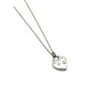 Tiffany & Co 18ct white gold heart pendant, set with five round brilliant cut diamonds, on a Tiffany