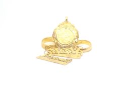 A collection of 22ct yellow gold jewllery. Consisting of two Rings, two name pendants & one