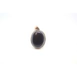 Victorian banded agate locket pendant, large polished cabochon of black agate, single continuous
