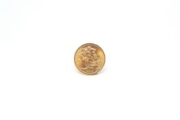 A full gold sovereign weighing approximately 8g