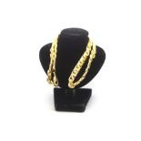 An 18ct gold yellow necklace. Approximately 42.40g