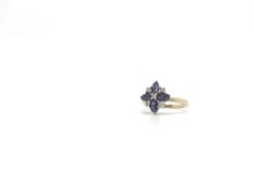 Amethyst and diamond ring, four oval cut amethyst with brilliant cut diamond detail, in yellow and