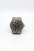 A Gentlemen's Military CWC Quartz wrist watch. The watch has the classic military luminous dial with