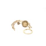 A 14ct Trinidad And Tobago Dollar with yellow gold mount and necklace as well as a 9ct gold ring.