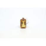 Citrine pendant, 20x16mm rectangular cut citrine four claw set, with a triangular suspended bail, in