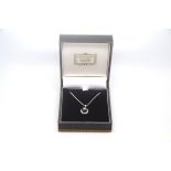 Black pearl and diamond pendant, 7mm black pearl with a diamond set border, 43cm chain, in white