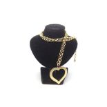 A 9ct gold yellow Chain with a heart pendant. Approximately 19 Grams
