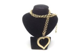 A 9ct gold yellow Chain with a heart pendant. Approximately 19 Grams