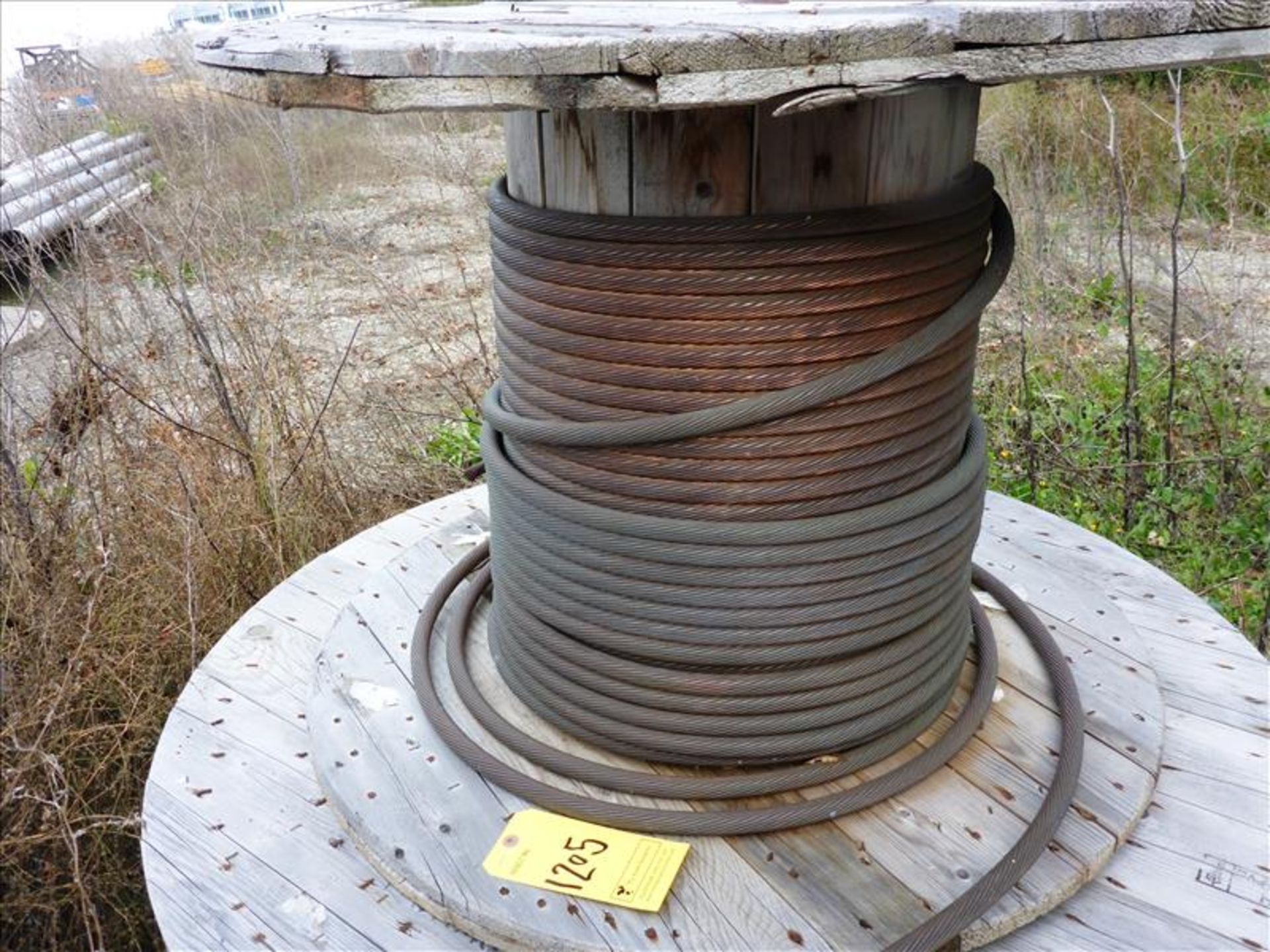 reel of electrical cable, approx. 150 ft. of bare copper wire (Tag No. 1205) THE BULK BID WILL BE