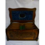 Fitted walnut sewing chest with blue fabric lined lid