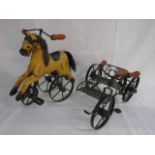Tin plate bicycle toy together with a tin plate rocking horse bicycle - both in miniature